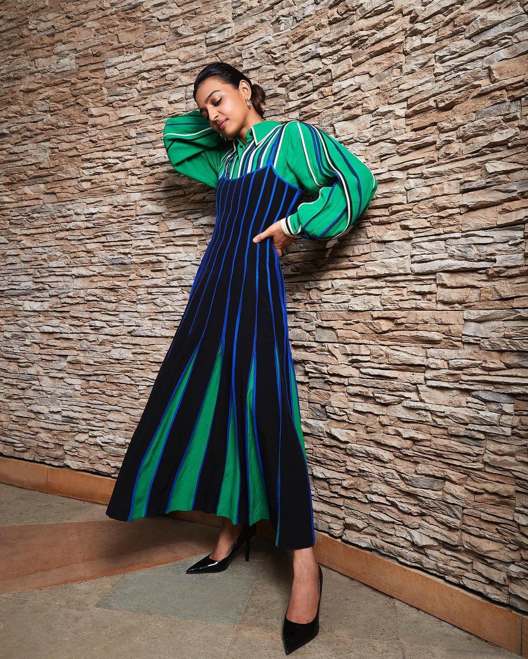 In a green and blue pleated dress, Radhika Apte effortlessly embodies casual chic.